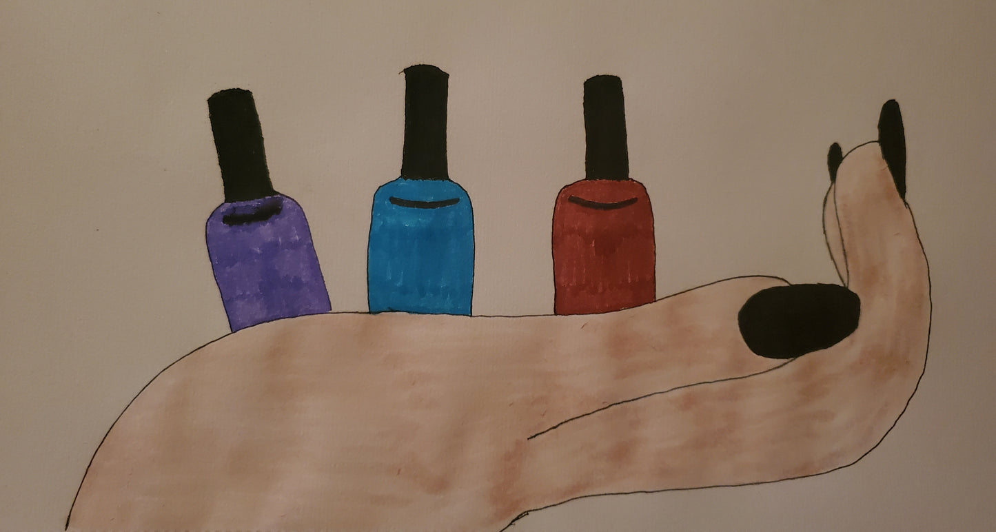Hand holding some nail polish