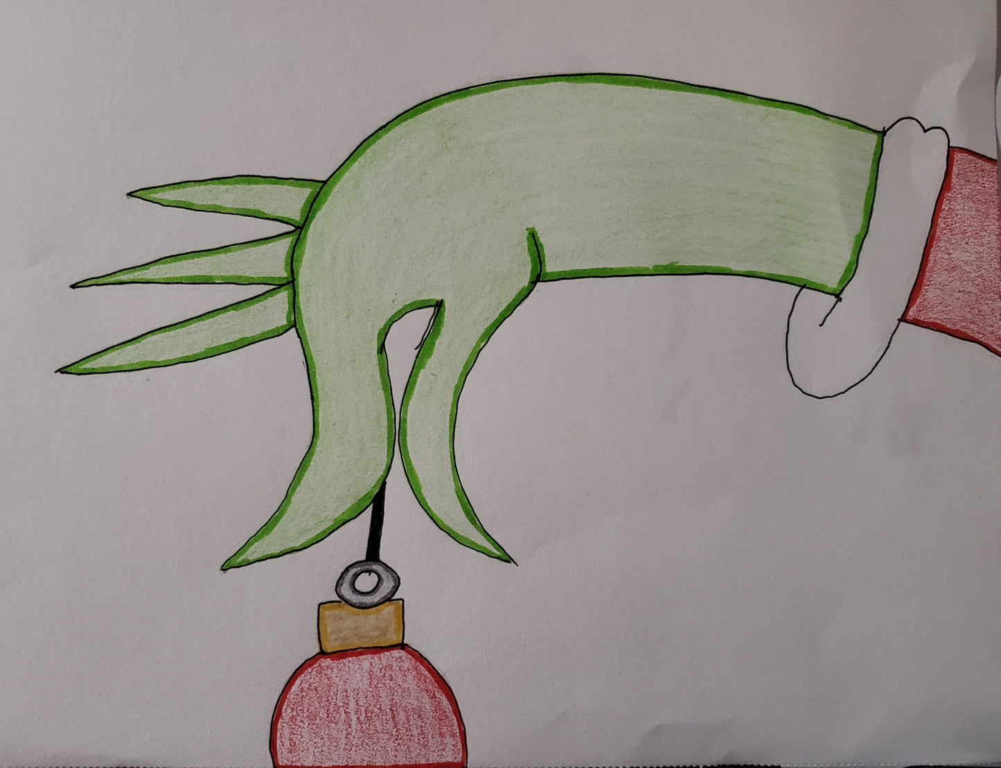 The Grinch holding an Ornament