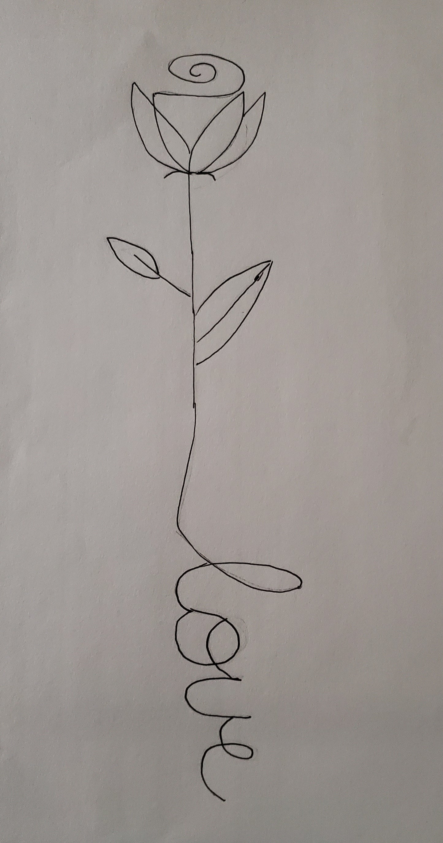 Outline of a rose that says Love