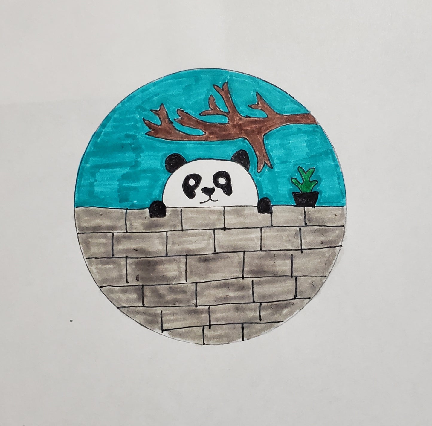 A panda peeking over a brick wall