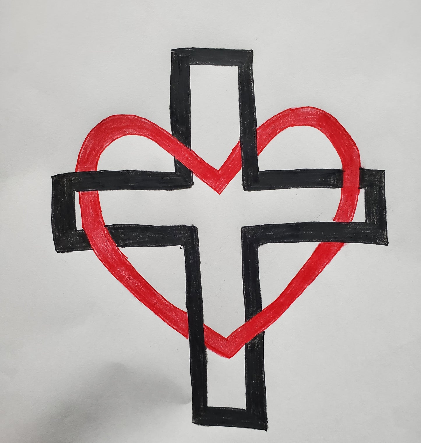 A cross with a heart through it