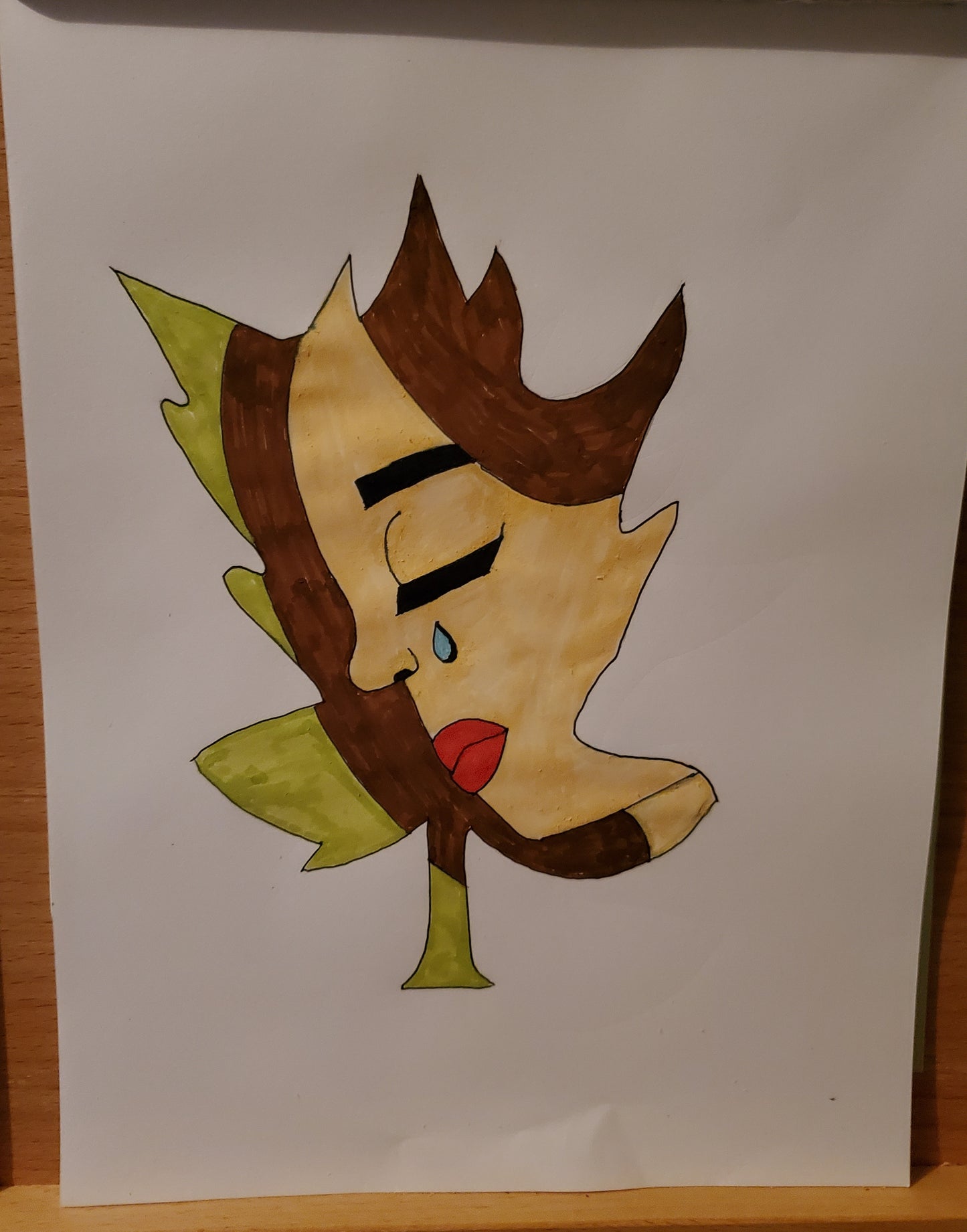 Crying girl in leaf