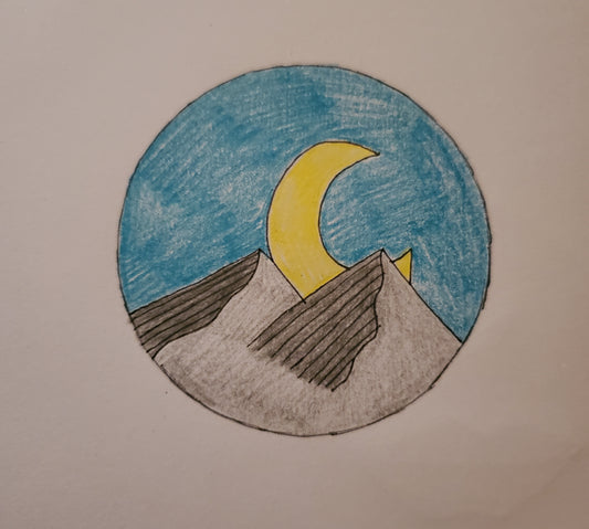 The moon shining on mountains