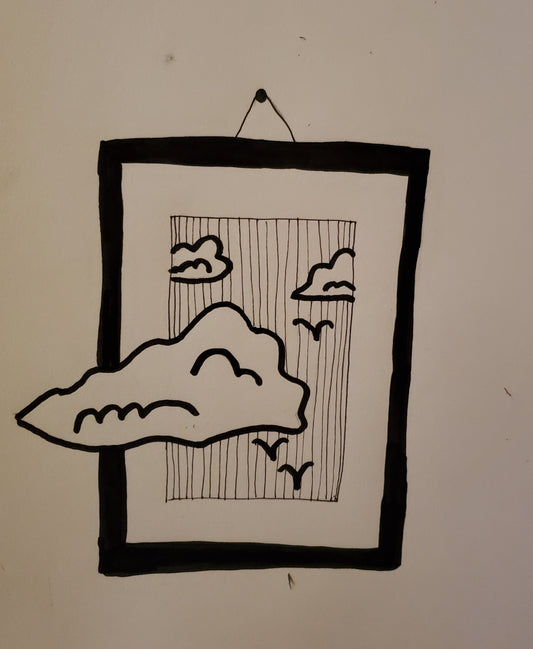 Framed picture of birds and clouds