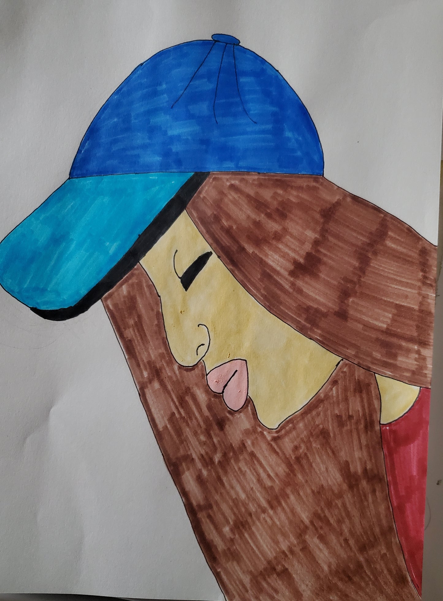 Chick wearing a ball cap