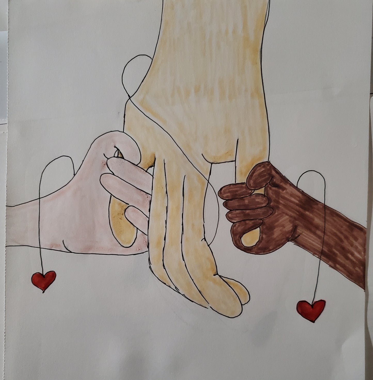 Little hands holding a bigger hand