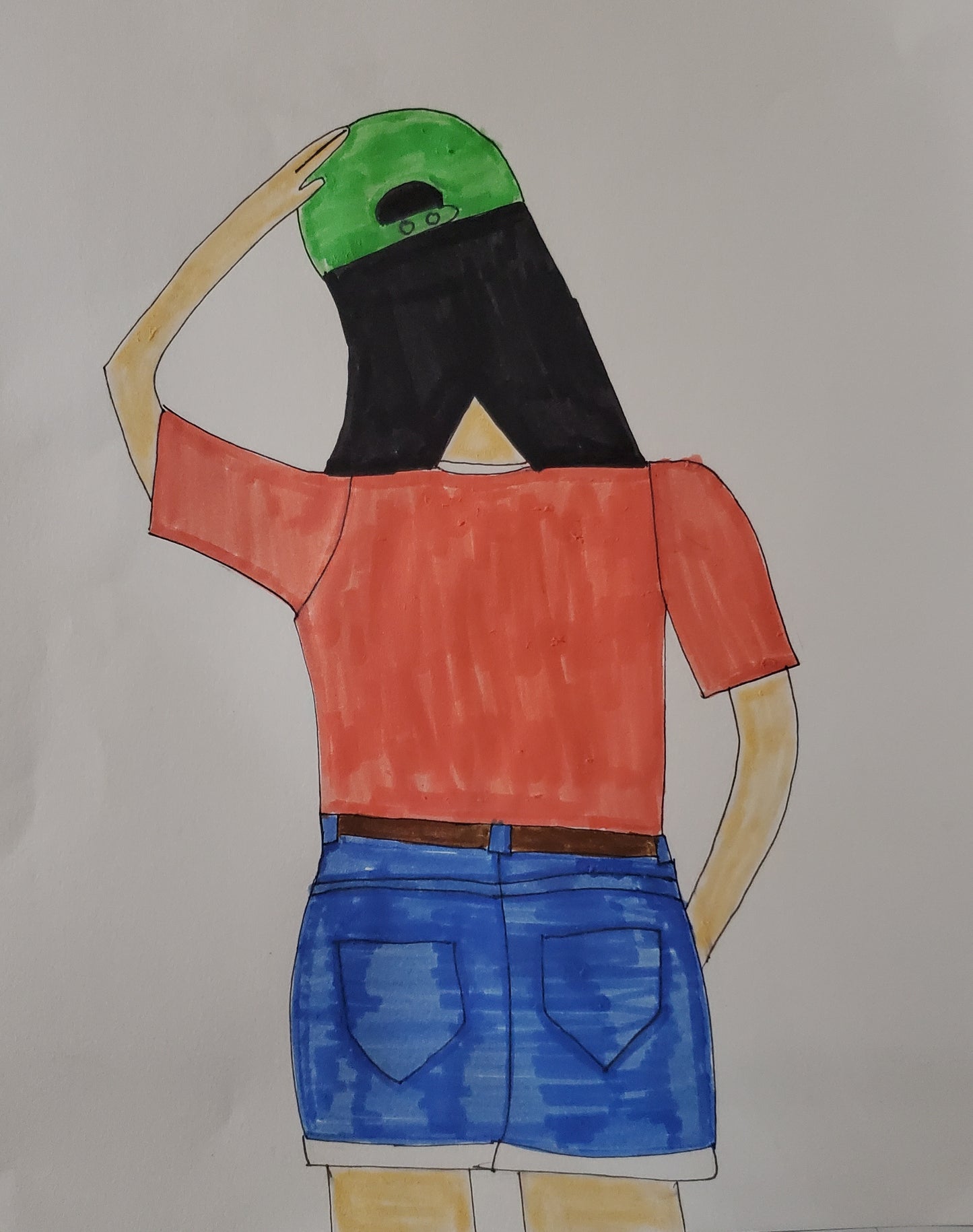 The backside of a girl wearing a hat