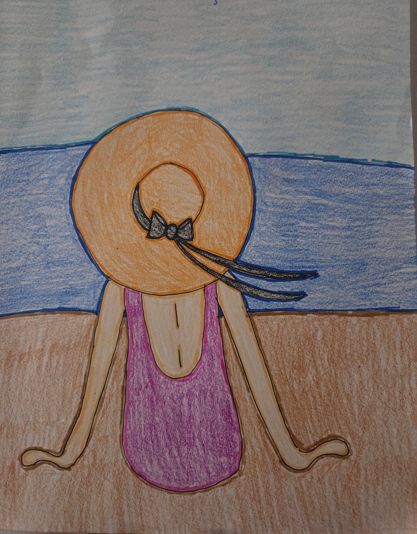 Chick sitting on the beach